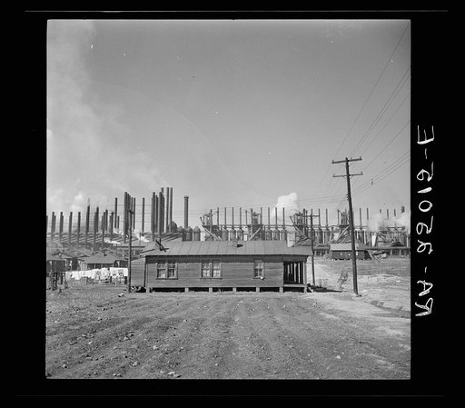 Company house near steel mill. Small garden plot in foreground. Ensley, Alabama