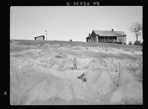 Eroded land on company-owned farm near Birmingham, Alabama