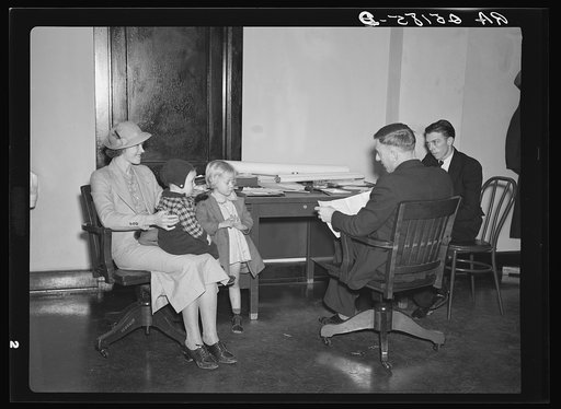 Interviewing applicants for homesteads at resettlement office in Birmingham, Alabama