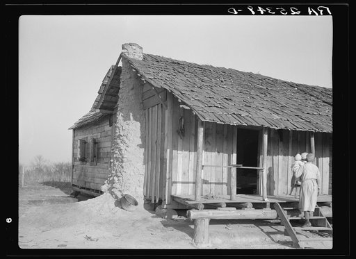 Cabin with mud chimney. Gees Bend, Alabama