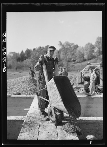 Member of Otsego Forest Products Cooperative working on the new modern sawmill. Cooperstown, New York