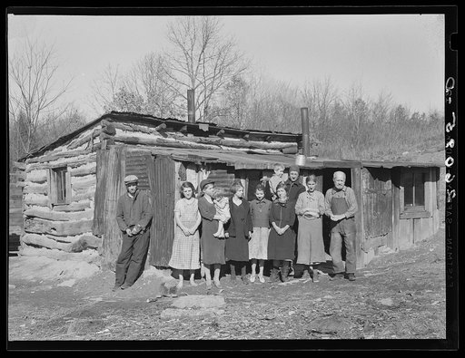 The Bittenger family and his cabin in which they live. Garrett County, Maryland