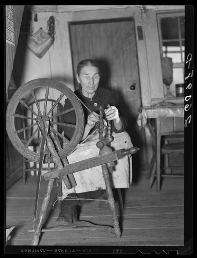 Minnie Knox spinning wool. Garrett County, Maryland