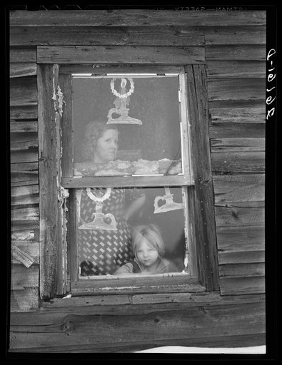 Wife and child of submarginal farmer. Oswego County, New York