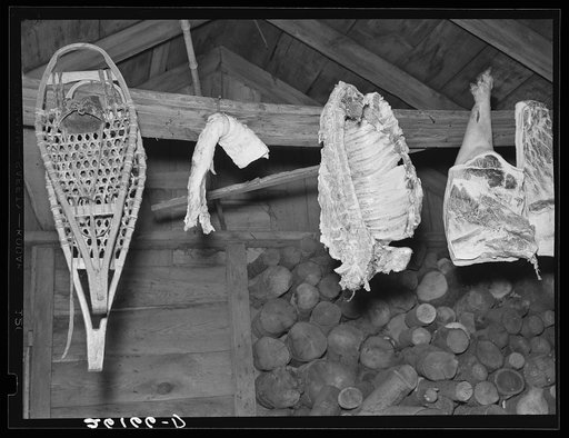 Meat in woodshed of Hugh Trumbull's farm. Oswego County, New York