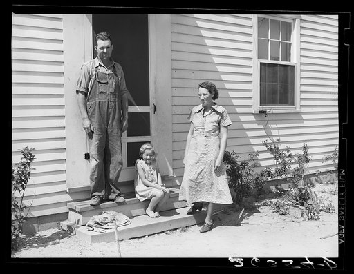 Member of cooperative, with wife and daughter. Wabash Farms, Indiana
