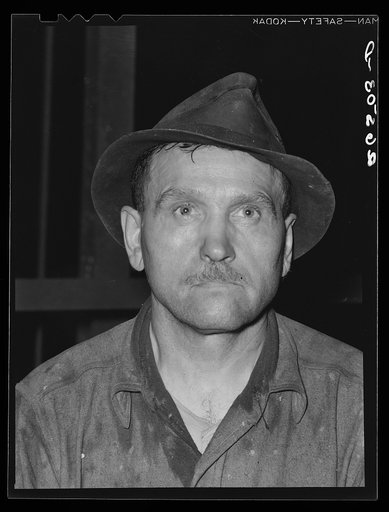Steel worker in Pittsburgh steel mill. Pittsburgh, Pennsylvania