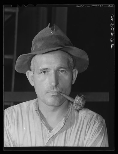 Steel worker in Pittsburgh steel mill. Pittsburgh, Pennsylvania