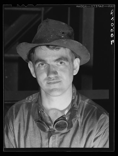 Steel worker in Pittsburgh steel mill. Pittsburgh, Pennsylvania