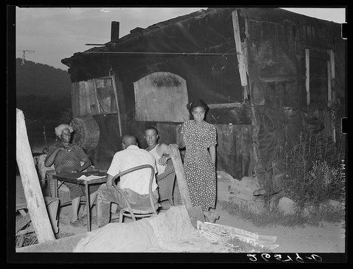 Tarpaper shacks on outskirts of town are a result of overcrowded conditions in existing homes for steel workers. Midland, Pennsylvania