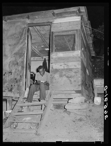 Tarpaper shacks on outskirts of town are a result of overcrowded conditions in existing homes for steel workers. Midland, Pennsylvania
