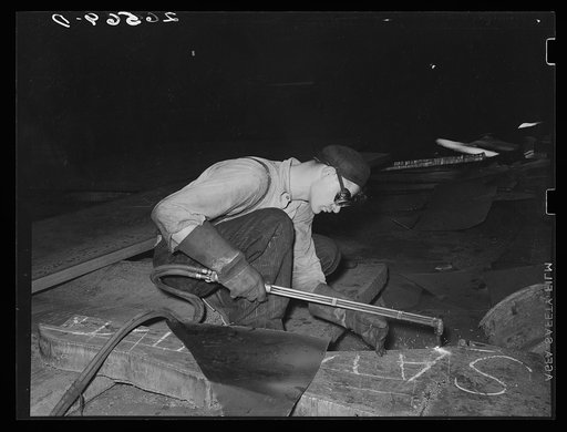Steel worker at rolling mill. Pittsburgh, Pennsylvania