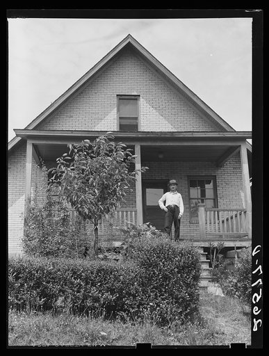 John Koltias on the steps of his home. Aliquippa, Pennsylvania