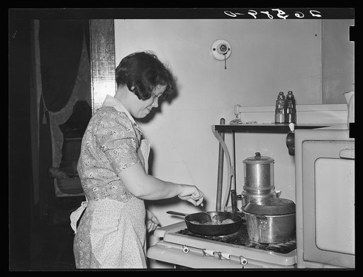 Mrs. Shorts cooking dinner. Aliquippa, Pennsylvania