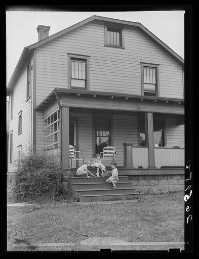The Shorts children playing on the steps of their home. Aliquippa, Pennsylvania