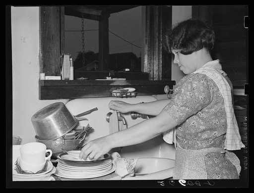 Mrs. Shorts washing the dishes. Aliquippa, Pennsylvania