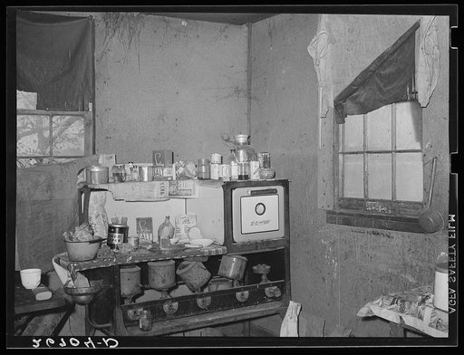 Kitchen in shack housing migratory apple pickers. Camden County, New Jersey