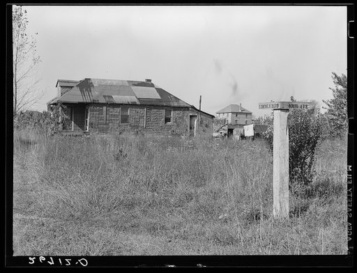 "Eighty Acres," real estate development that failed, in which agricultural laborers for nearby corporation farms live. Glassboro, New Jersey