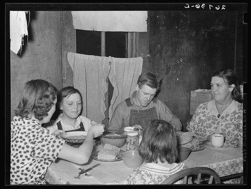 WPA (Works Progress Administration) worker and family at dinner. Zeigler, Illinois