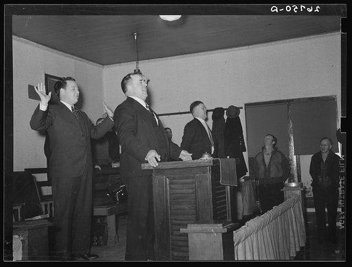 Prayer during revival meeting. Pentecostal church, Cambria, Illinois