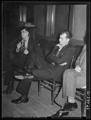 Untitled photo, possibly related to: Miners at meeting of UMWA (United Mine Workers of America) local. Herrin, Illinois