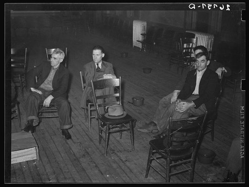 Untitled photo, possibly related to: Miners at meeting of UMWA (United Mine Workers of America) local. Herrin, Illinois