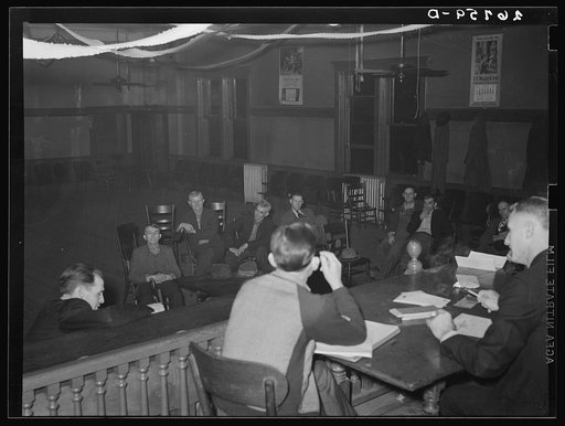 Untitled photo, possibly related to: Officers of local of UMWA (United Mine Workers of America) at meeting. Herrin, Illinois