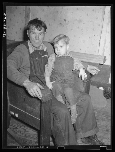 Coal miner now on relief, with son. Zeigler, Illinois