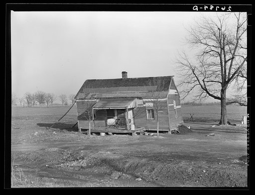 House damaged by flood. Saline County, Illinois
