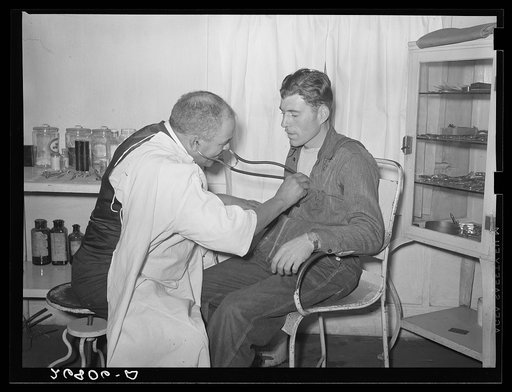 Dr. Springs examining patient. Colp, Illinois