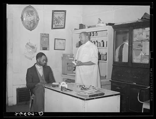 Dr. Springs with patient. Colp, Illinois