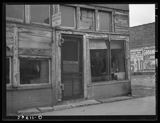 Abandoned store in which coal miner on relief lives. Zeigler, Illinois
