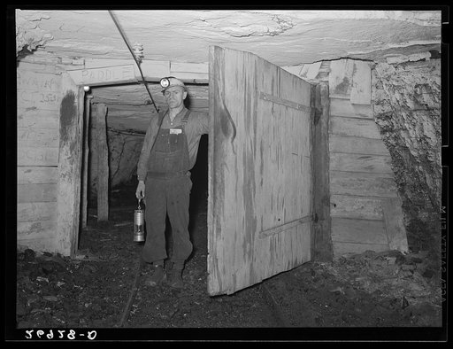 Safety inspector. This man uses a special lamp to test for gas throughout the mine. Old Ben number eight, West Frankfort, Illinois (see 26980-D)