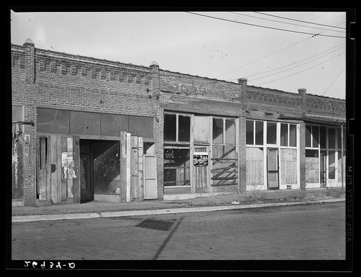 Untitled photo, possibly related to: Abandoned stores. Cambria, Illinois