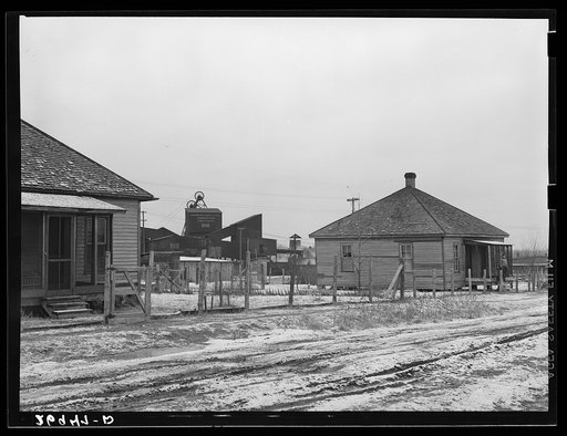 Miners' homes with coal tipple in background. Freeman Spur, Illinois