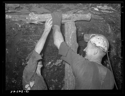 Shoring up the roof of the mine. Old Ben number eight. West Frankfort, Illinois (see 26980-D)