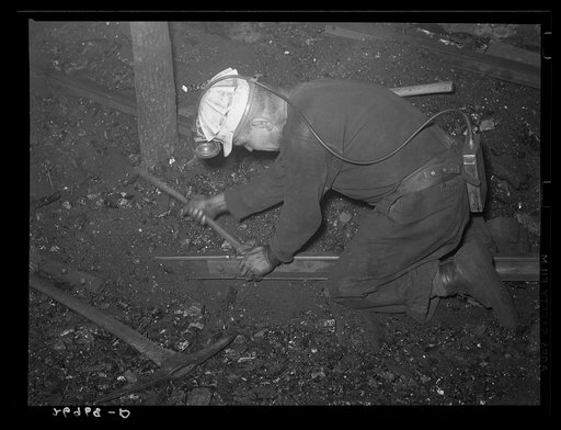 Laying track underground. Old Ben number eight mine. West Frankfort, Illinois