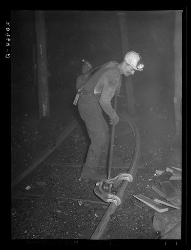 Laying track in coal mine. Old Ben number eight mine. West Frankfort, Illinois