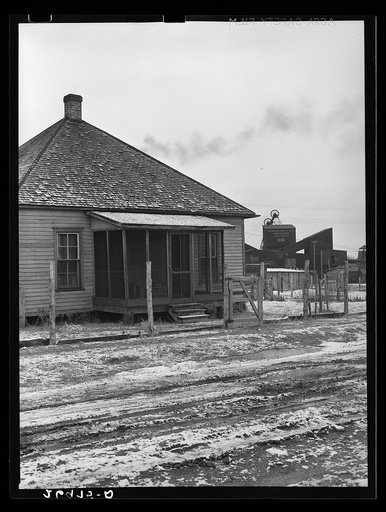 Untitled photo, possibly related to: Miners' homes with coal tipple in background. Freeman Spur, Illinois