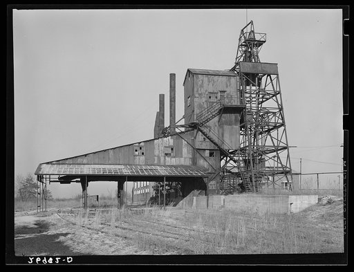 Untitled photo, possibly related to: Consolidated Coal Company, Lake Creek Mine, Johnston City, Illinois. Abandoned. This mine will never work again. Williamson County, Illinois once produced 11,000,000 tons of coal a year and led the state in output. Since 1923, output has steadily declined until n