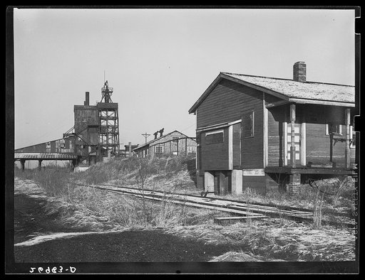 Untitled photo, possibly related to: Consolidated Coal Company, Lake Creek Mine, Johnston City, Illinois. Abandoned. This mine will never work again. Williamson County, Illinois once produced 11,000,000 tons of coal a year and led the state in output. Since 1923, output has steadily declined until n