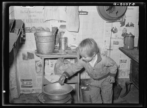 Untitled photo, possibly related to: Son of man on relief. Herrin, Illinois