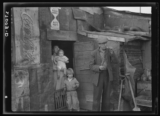 Untitled photo, possibly related to: Family on relief living in shanty on city dump. Herrin, Illinois