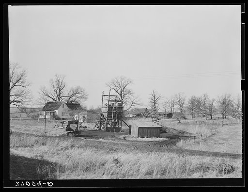 Farm on which a gopher hole has been placed, with agriculture giving way to coal mining. Williamson County, Illinois