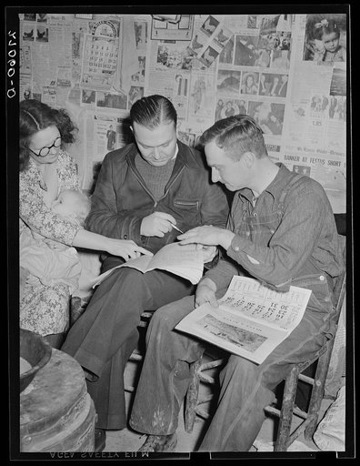 Untitled photo, possibly related to: Rehabilitation Administration supervisor with client and wife. Gallatin County, Illinois
