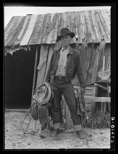 Walter Latta with saddle and bridle. Bozeman, Montana