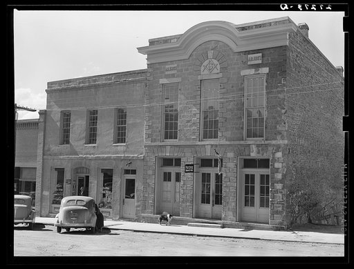 Post office, Masonic temple and drug store. Virginia City, Montana