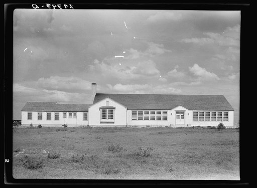 School and community center. Fairfield Bench Farms, Montana