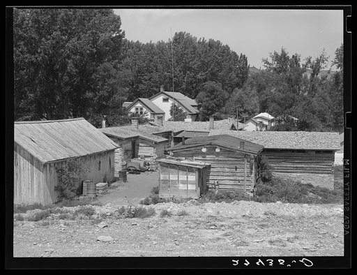 Bunkhouse, sheds and main house. Quarter Circle U Ranch, Montana