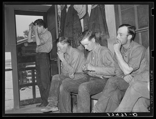 Cowhands waiting for call to dinner. Quarter Circle 'U' Ranch, Montana